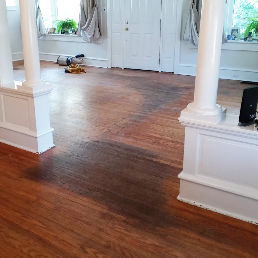dark stained worn areas from entrance