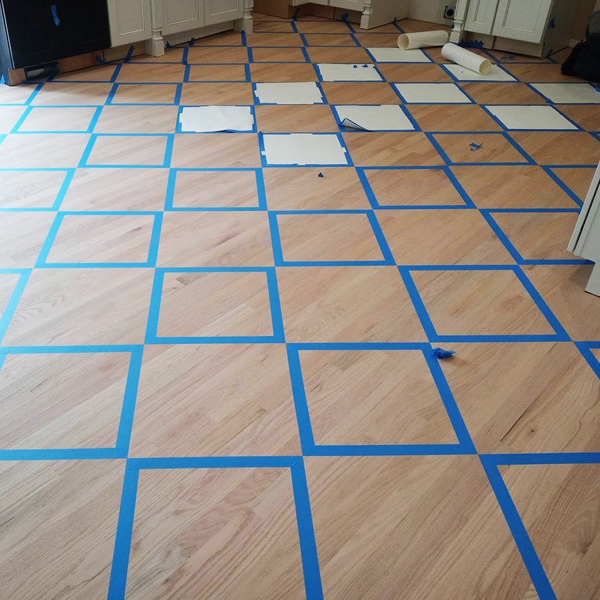 taping off squares on wood floor