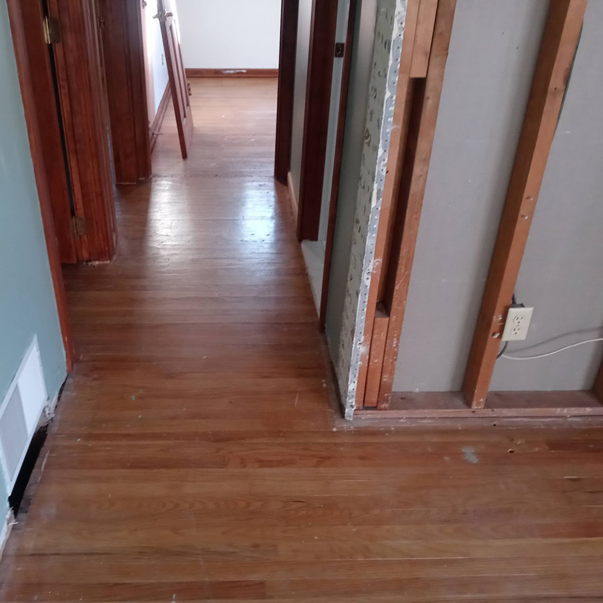 yellow, scratched and damaged hardwood